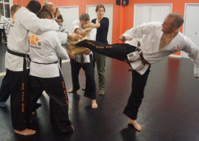 IF Brown Belts dont pass 'kato accuracy test' they have to find their own vollunteers to hold the wood
