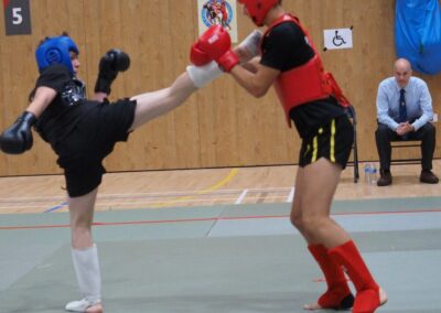 Artur (16) in Sanda semi final fight against much taller fighter