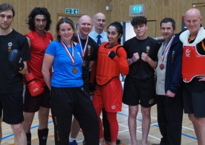 SSK Adult Vets and Youth team with coaches Dave (tie) and Pete on right