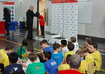 Sifu Dave as PA on microphone during national medal presentations